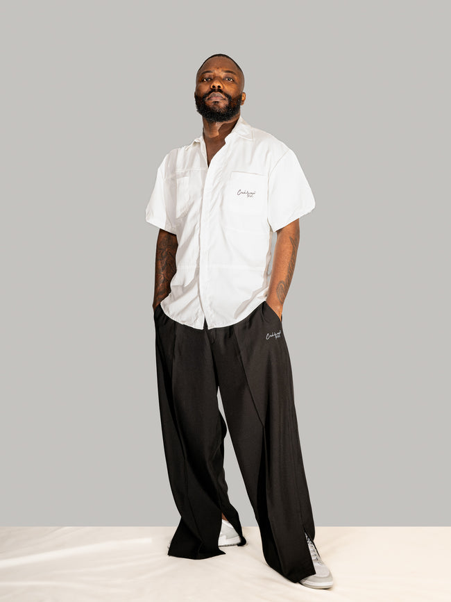 PANTALON HAUTE COUTURE EN POLYESTER IMPRIMÉ LOGO CREKMONGA PARIS, DEUX FENTES