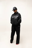 PANTALON HAUTE COUTURE EN POLYESTER IMPRIMÉ LOGO CREKMONGA PARIS, UNE FENTE