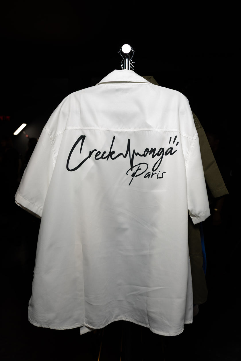 CHEMISE HAUTE COUTURE À MANCHE COURTE , COUPE OVERSIZE, À DEUX FENTES, EN POLYESTER ET COTON IMPRIMÉ – CREKMONGA PARIS