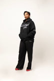 PANTALON HAUTE COUTURE EN POLYESTER IMPRIMÉ LOGO CREKMONGA PARIS, UNE FENTE